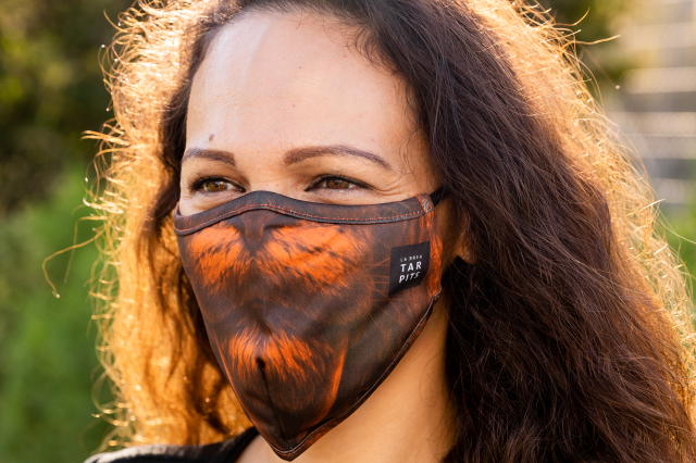 Woman in saber-toothed mask