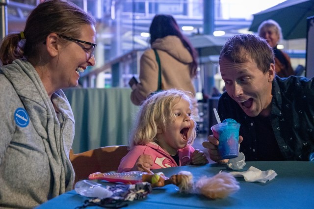 Member Family in Becoming Jane Opening Reception eating ice cream