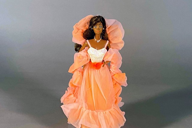 Barbie doll in peach dress