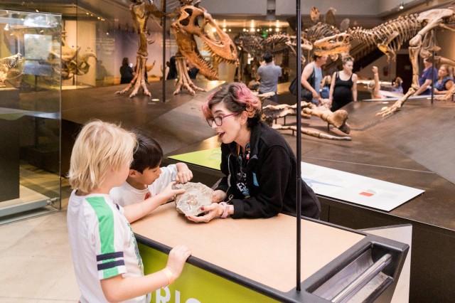 gallery interpreter with kids curiosity cart dinosaur hall