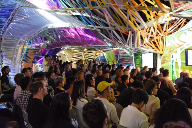 Guests seated inside Second Home Serpentine Pavilion