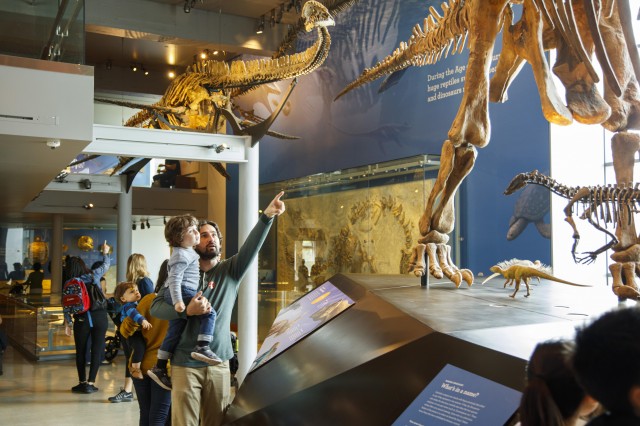 Member Father and son inside Dino Hall