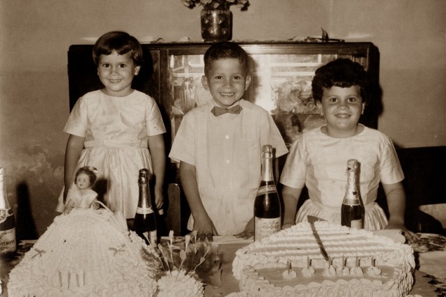 Betty Porto and family with cakes