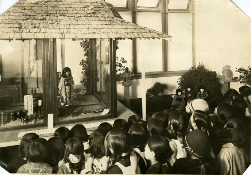 Japanese children attending a departure ceremony for the Japanese Friendship Doll 