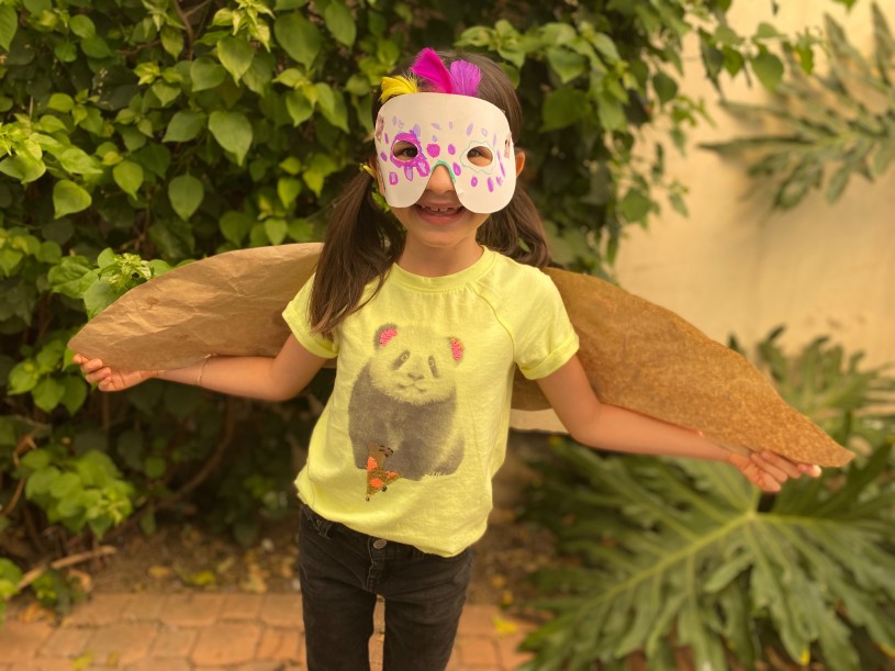 Adventures in Nature Connected Camper Ava Corgan with mask and wings