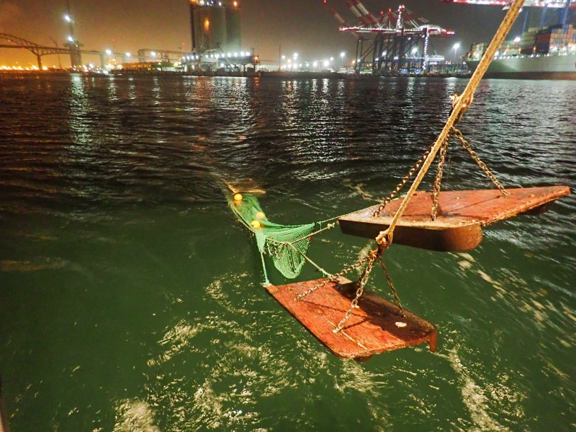 Recovering sampling trawl net at night