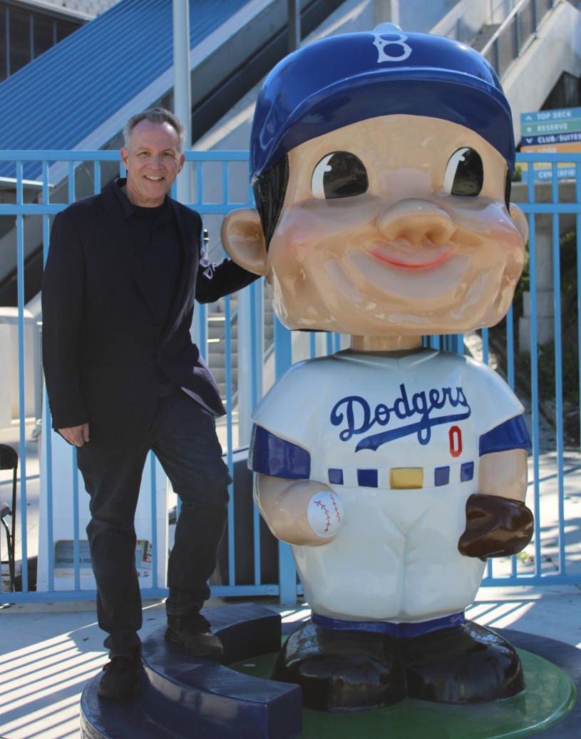 Mark poses with large bobblehead 