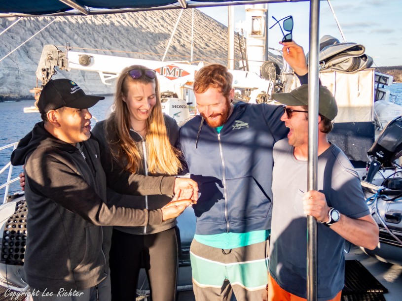 Dr. Carlos Sanchez, Ellie Place, Ben Frable, William Ludt - holding &amp; celebrating the new species holotype of Halichoeres sanchezi,  Tailspot wrasse, on the deck of a boat